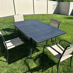 Patio Table and Four Chairs 