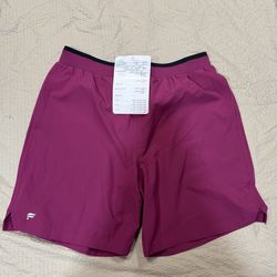 Fabletics 7” fundamental short unlined radiant raspberry men’s shorts size large new
