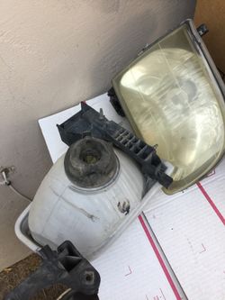 Headlights OEM tacoma 2000-2004