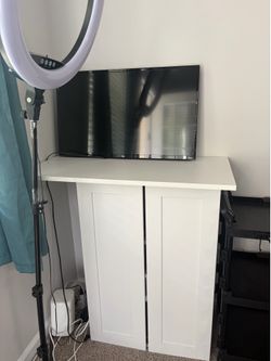 Tv and cabinet