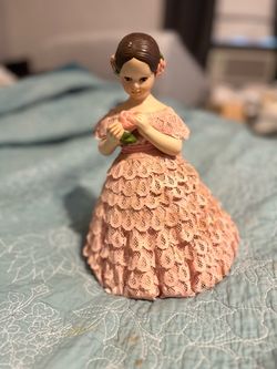 Ceramic and lace girl figurine