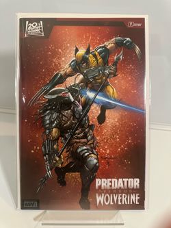PREDATOR VS WOLVERINE #1 TYLER KIRKHAM BLOOD BLAST VARIANT