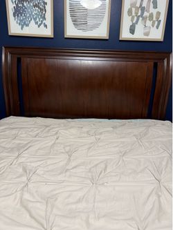 Solid wood brown queen headboard and bed frame