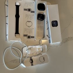 Apple Watch Series 9 45mm Midnight Aluminum Case & New Series 11 strap.
