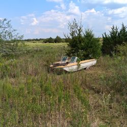 Boat With Mercury Outboard.