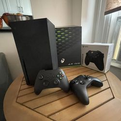 Xbox Series X with 2 controllers