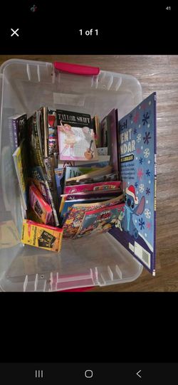 Bin of books mostly unused