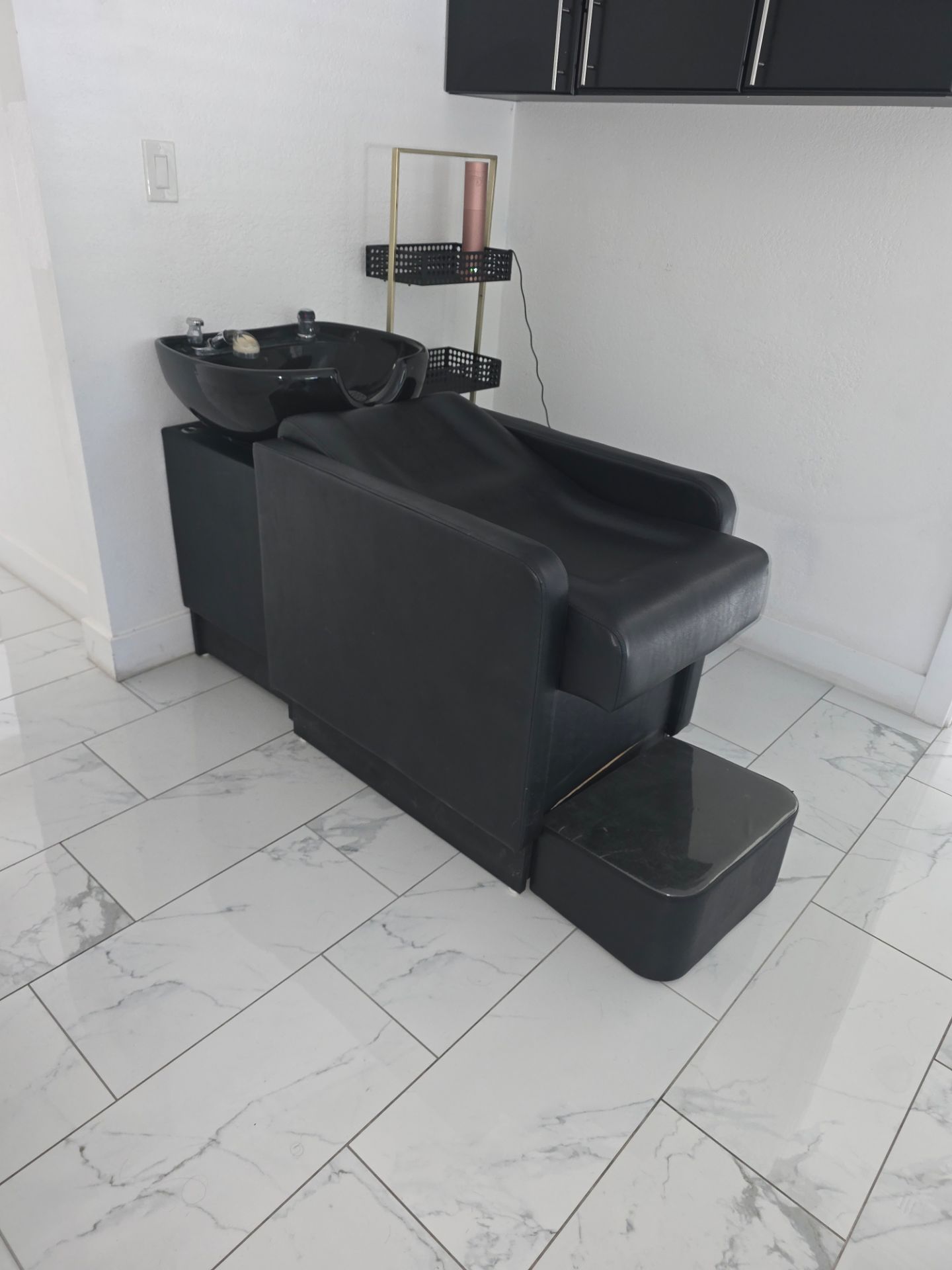 Lay down shampoo chair with foot stool