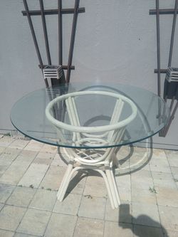 7 Rattan Dining tables 50 each