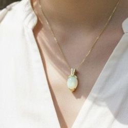 14 K Gold pendant with Australian Opal and Diamonds 