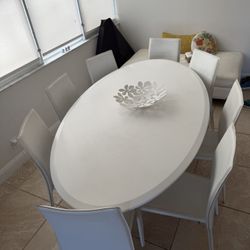 Dining Table with 8 Chairs – Good Condition