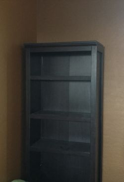 Book stand shiny dark wood looks very nice in rooms