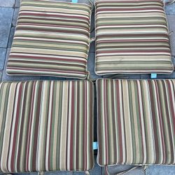 4 Piece Outdoor Patio Furniture Cushions in Multi-Color Stripes   Located in concord  Very good condition  No damages Covers not removable   Measures 
