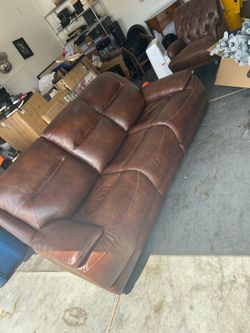 Beautiful Brown Leather Large Couch two electric leg rests