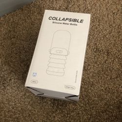 collapsible dog water bottle dispenser In color Pink 