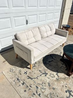 Cream white sofa