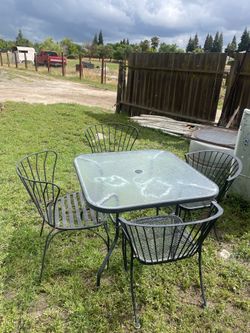 Patio table with metal chairs