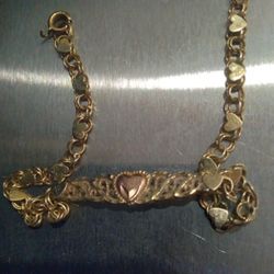 14KT GOLD HEARTS BRACELET