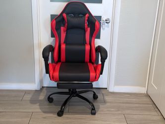 BLACK AND RED FAUX LEATHER OFFICE CHAIR ( NEW AND ASSEMBLED )