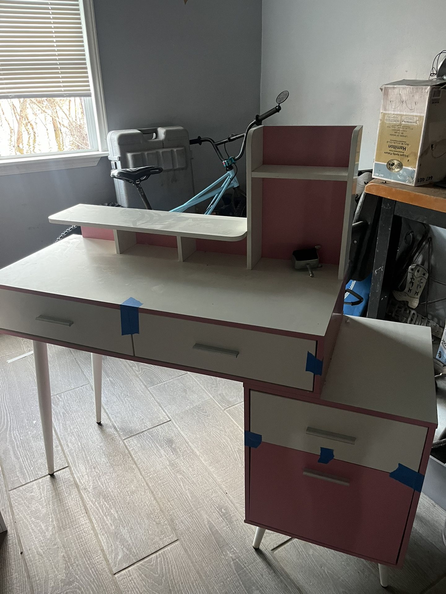 Pink and white vanity