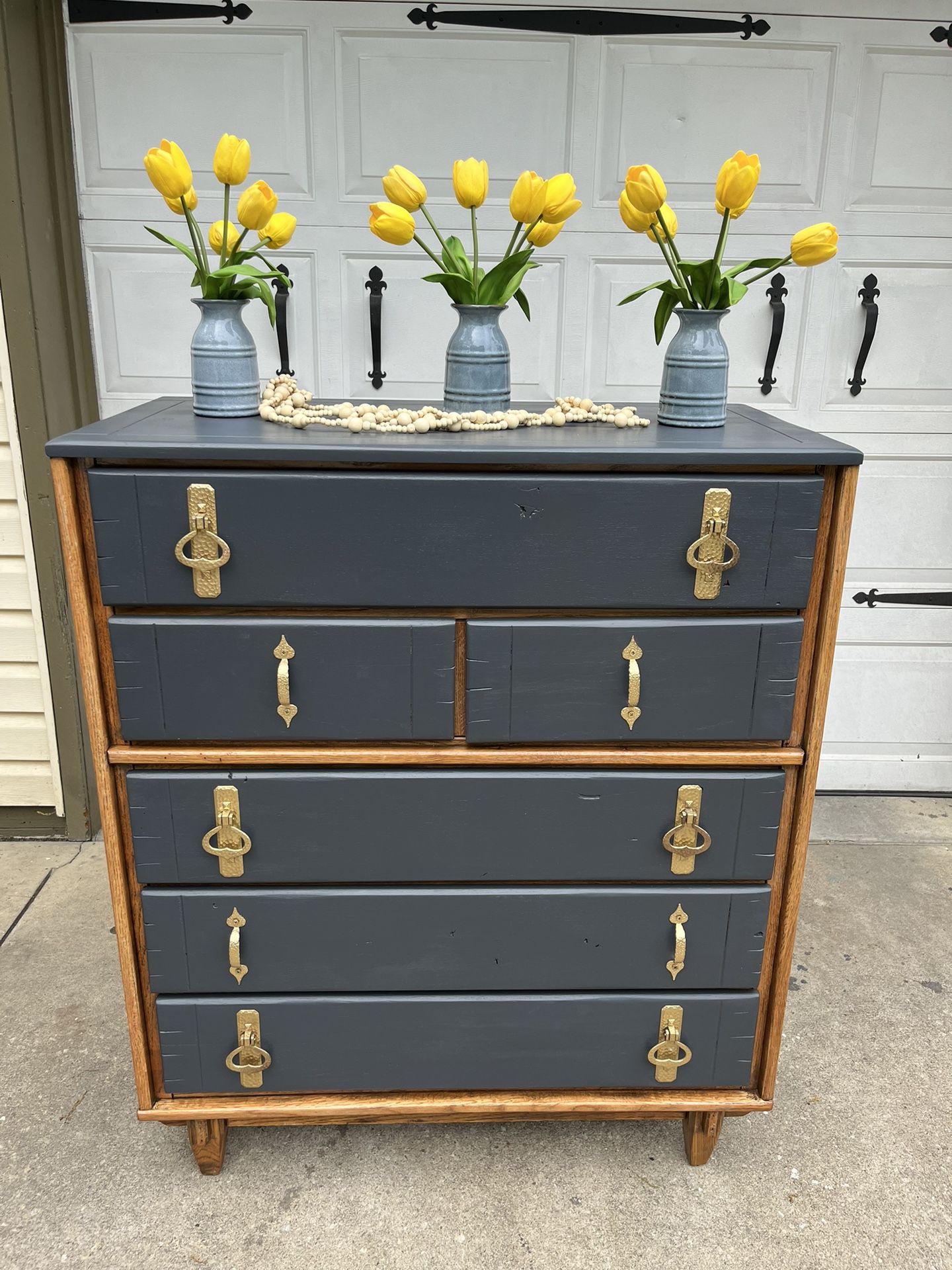 Tall Dresser Painted In Navy Blue With Gold Handles. 