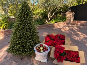 9ft Christmas Tree with 3 boxes full of Christmas tree decor.