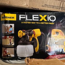 Handheld paint sprayers