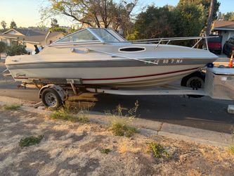 BOAT IN WELL CONDITION STILL RUNS COMES WITH EVERYTHING INCLUDING SONAR MOTOR WORKS NO HOLES 10k or obo