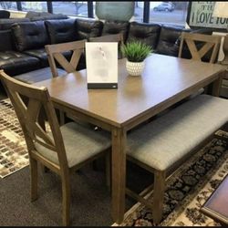 Clara -(6 Pc. Table, 4 Chairs, Bench)Brown Light  Dining Table Set
by Crown Mark🚨Finance&Delivery Available