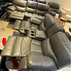 New year sale. Madrid, gray leather reclining sofa and loveseat set $1099. Easy finance option. Same day delivery.