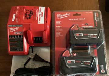 Milwaukee 2PK M18 Batteries XC5.0 And M18/M12 Charger.  Brand NEW.