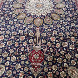 9’.9” X 15’.11” Signed hand knotted over-sized Persian Tabriz rug perfect