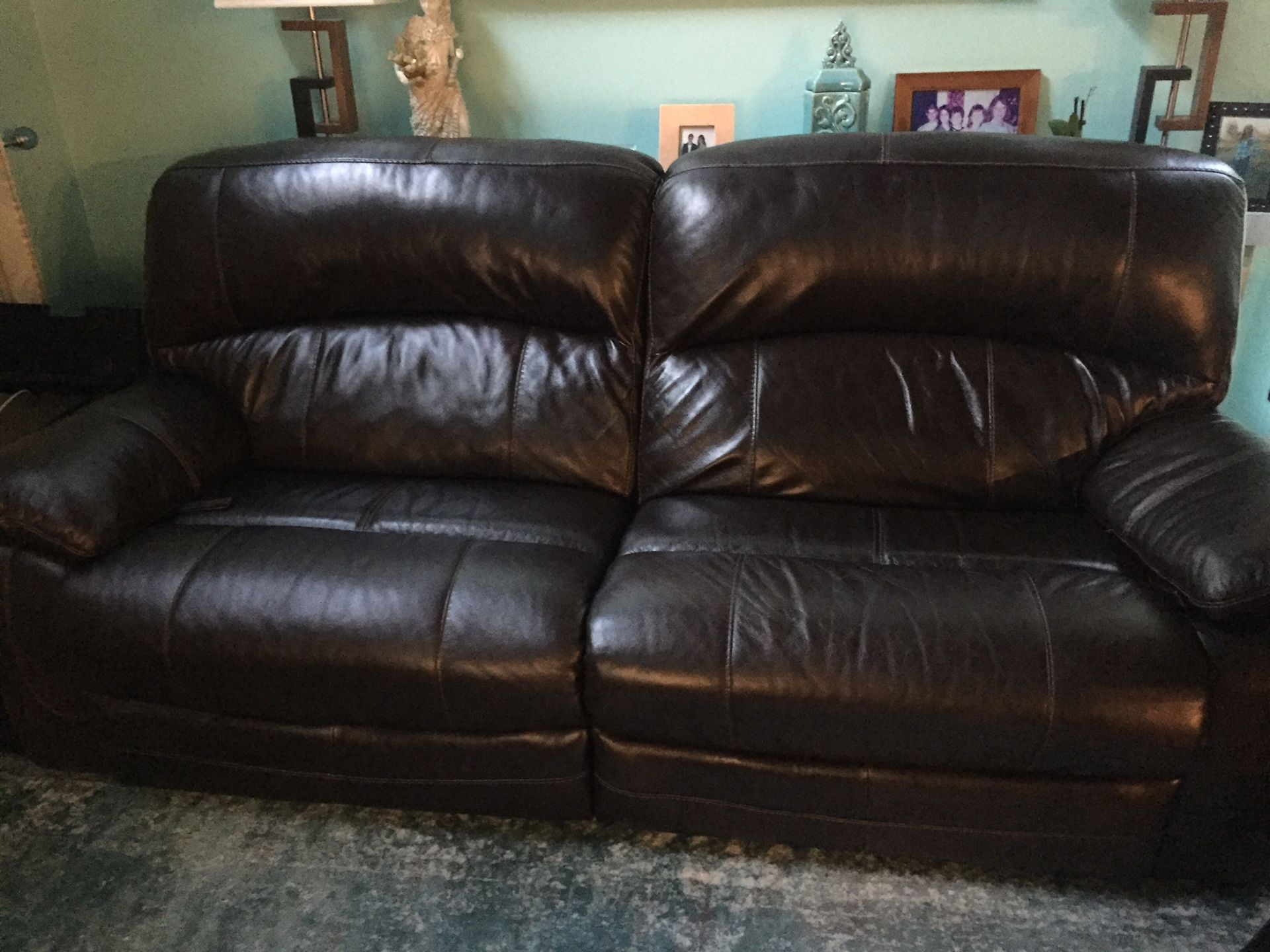 Leather reclining couch and single recliner