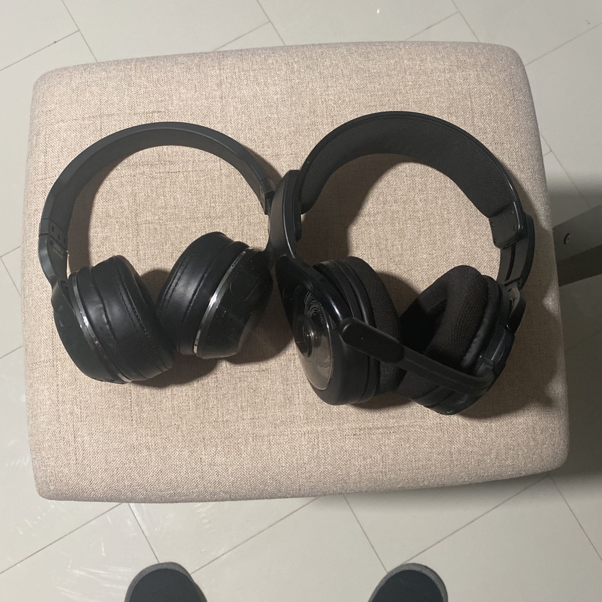 Two Wireless Bluetooth Headsets