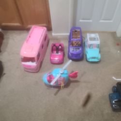 Barbie Cars, A Helicopter, And A Camper