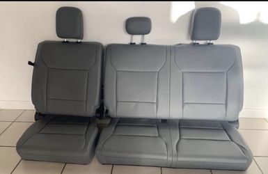 2023 F-150 rear seats, featuring a 60/40 split configuration and gray leather.