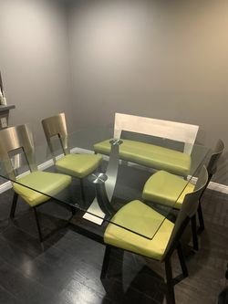 Home furniture table with four chairs and bench
