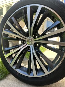 2 Dunlop P255/40rf19 Tire with Infiniti Rim