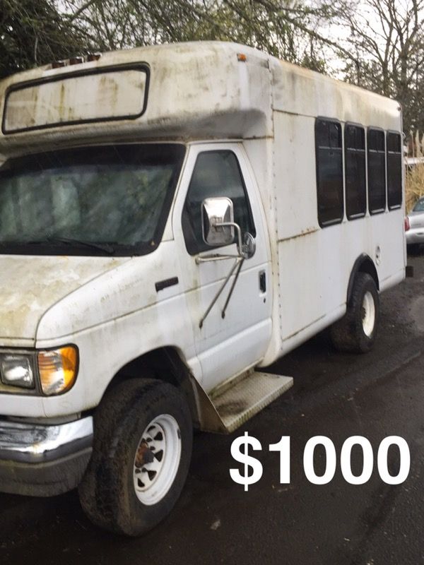 Gutted Shuttle bus.. food truck/party bus??