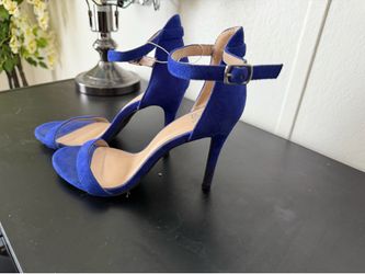 Women’s beautiful cobalt, blue heel shoes