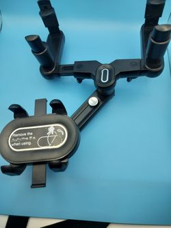 Rear view mirror cell phone holder (used)
