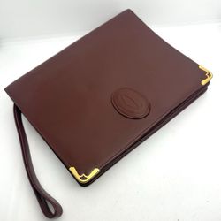 Cartier Must de Cartier Bordeaux Leather Clutch – Vintage Elegance 💼 MSRP: $900+ | Available now for $295 