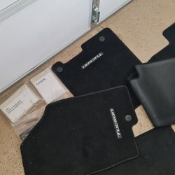 Hyundai TUSCON floor Mats And Manual.