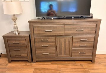 from ASHLEY FURNITURE dresser and nightstand in great condition available for sale. Clean in great condition and with a lot of space in the cabinets
