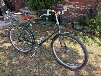 Raleigh Tourist classic city bike with a brown  leather saddle seat in great shape