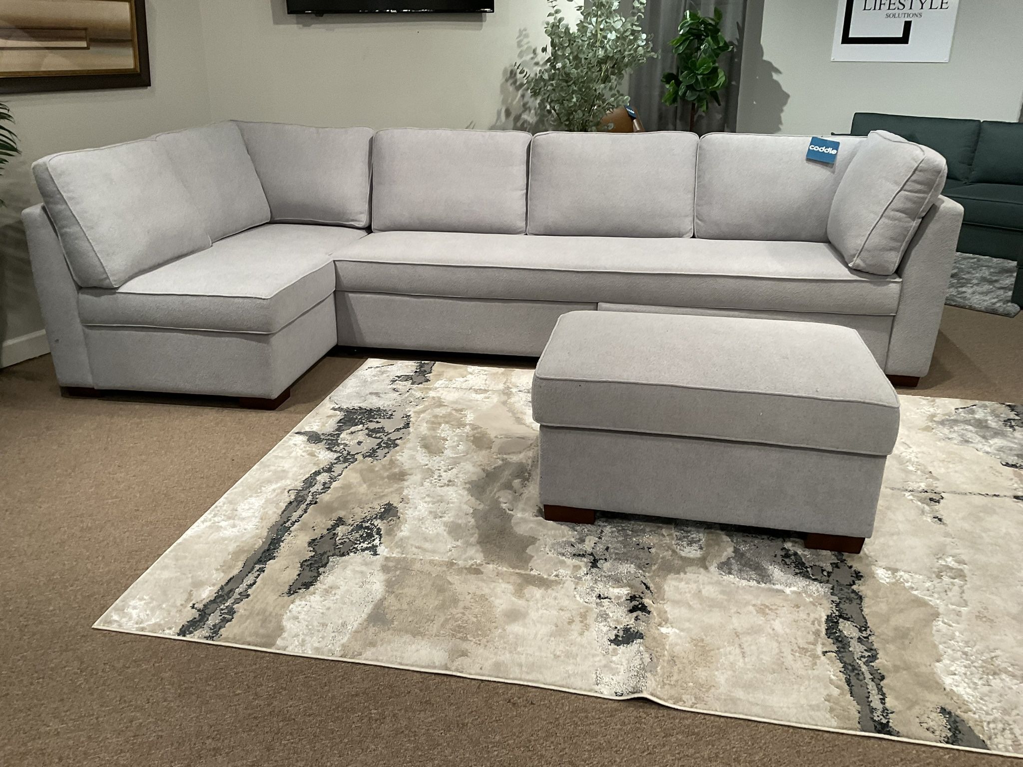 New light gray fabric upholstered doubler sleeper sofa by serta