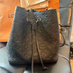 Louis Vuitton Leather Bucket Bag