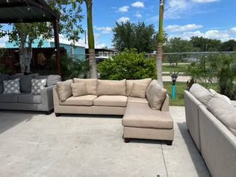 Beautiful lite brown seminew sectional in great condition super comfy and nice asking 450