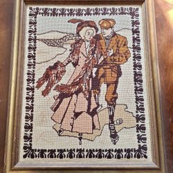 Vintage Framed needlepoint artwork of a couple in 1920s attire