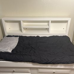 Twin size bed frame w built in shelves and trundle